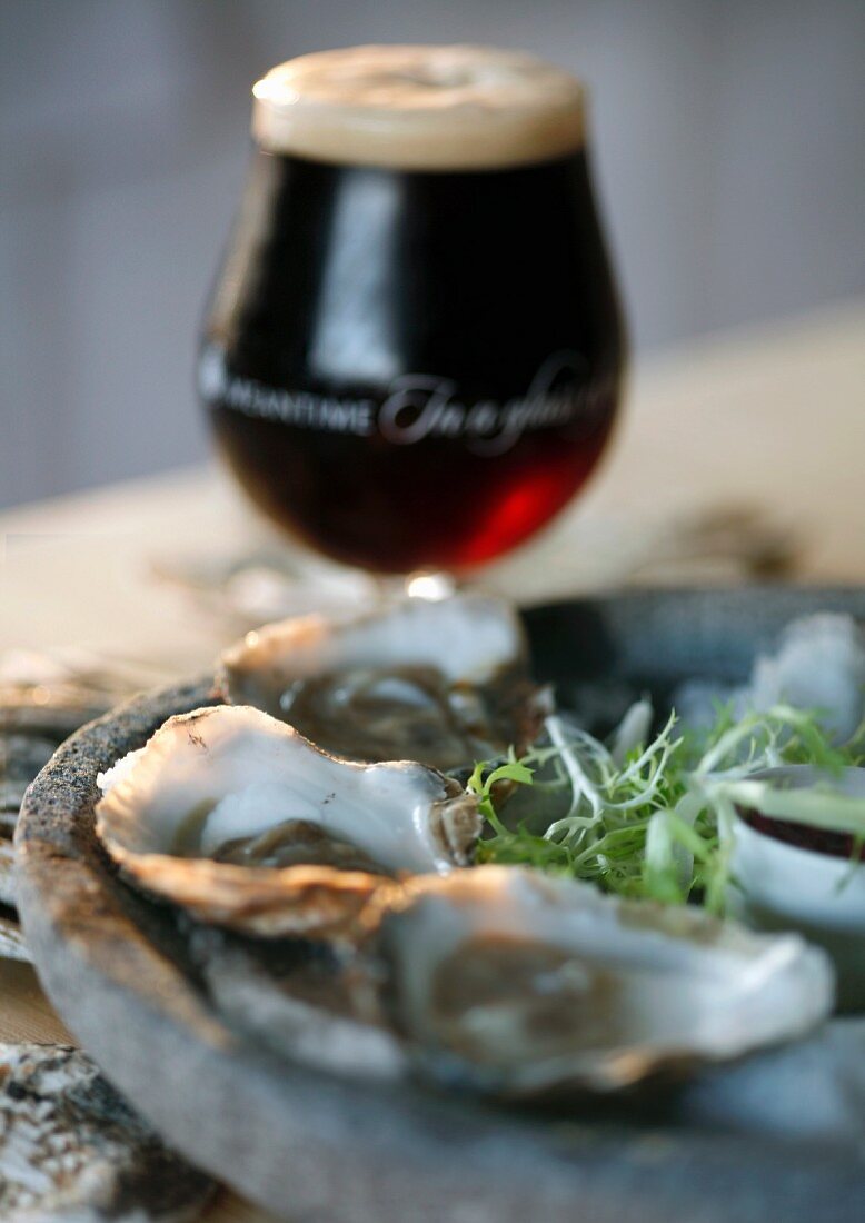 Grilled oysters with dark beer