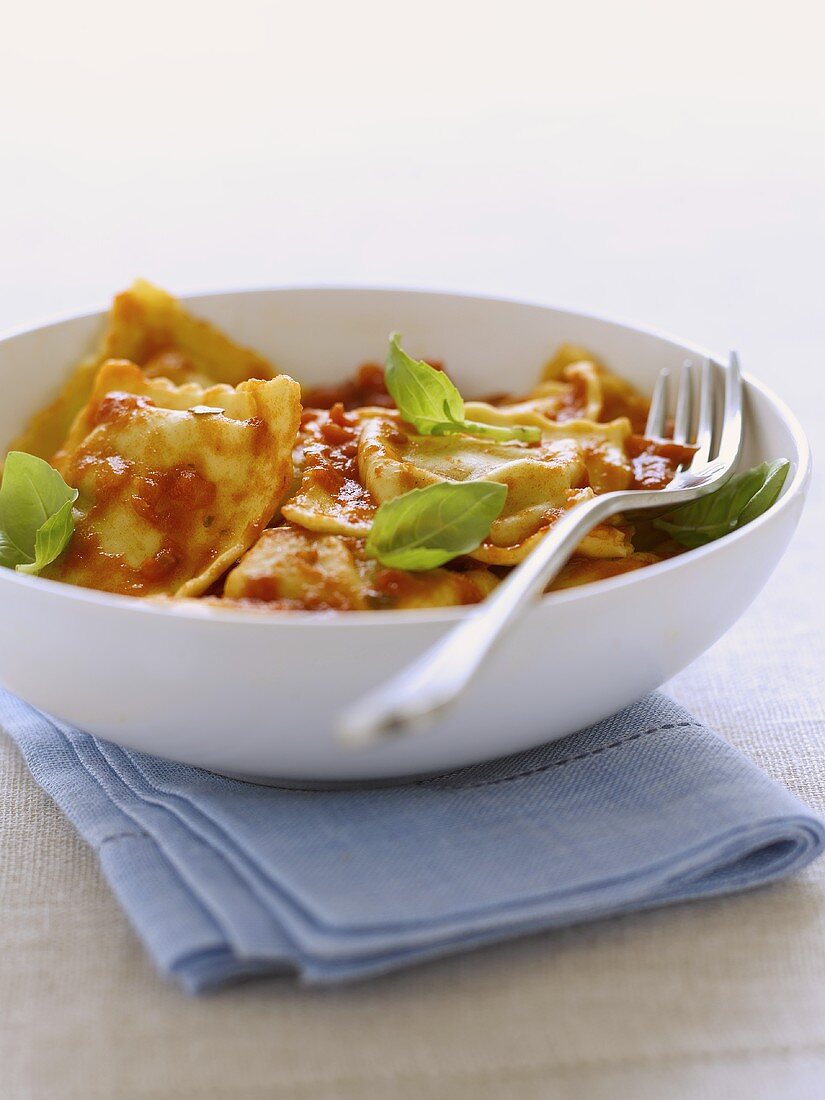 Ravioli with tomatoes and basil