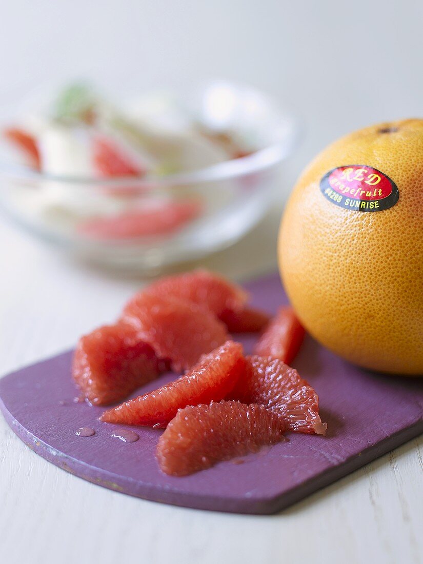 Grapefruit segments and whole grapefruit