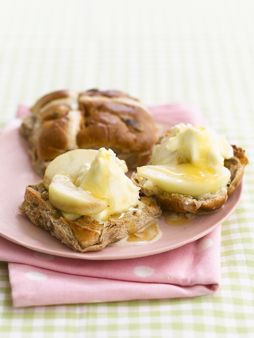 Hot cross buns with butter and syrup