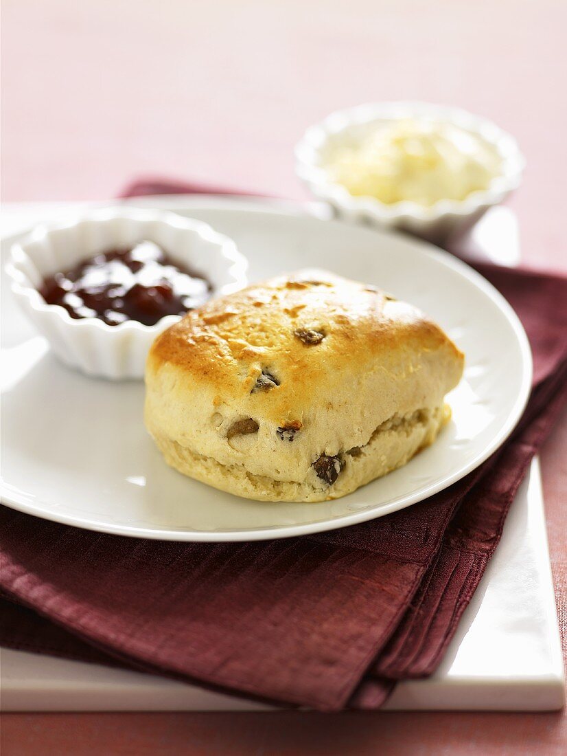 Scone with jam and butter