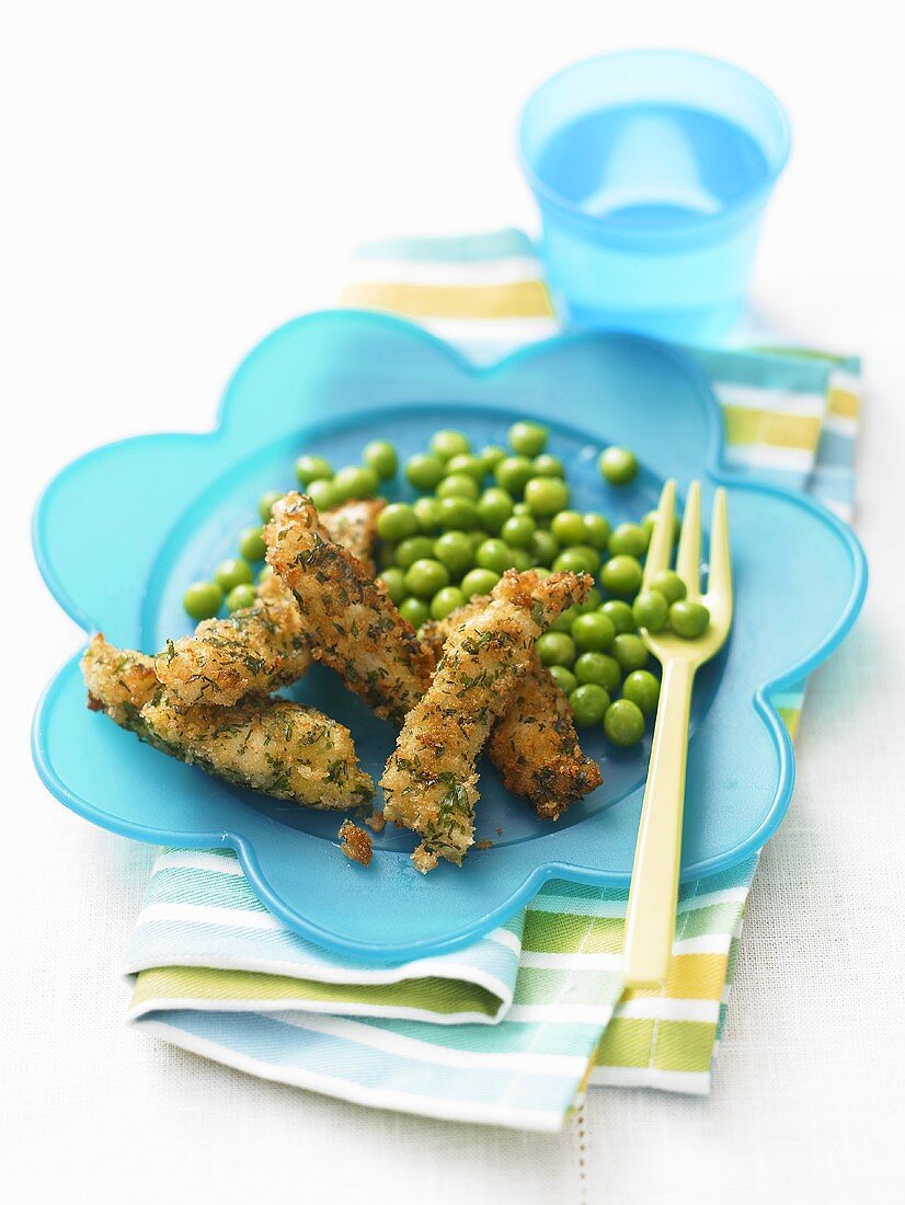 Breaded strips of fish with peas