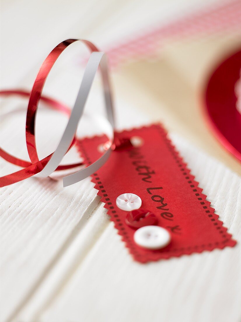 Gift tag with the words 'with love'