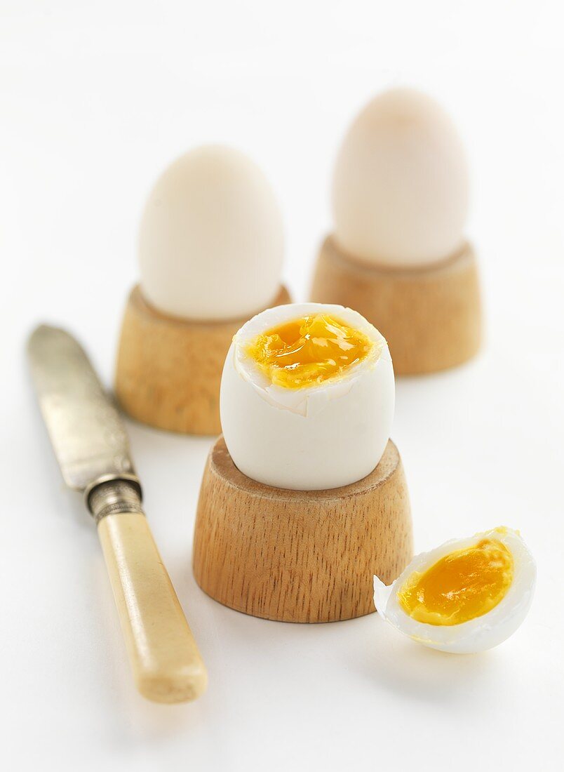 Boiled duck eggs in egg cups
