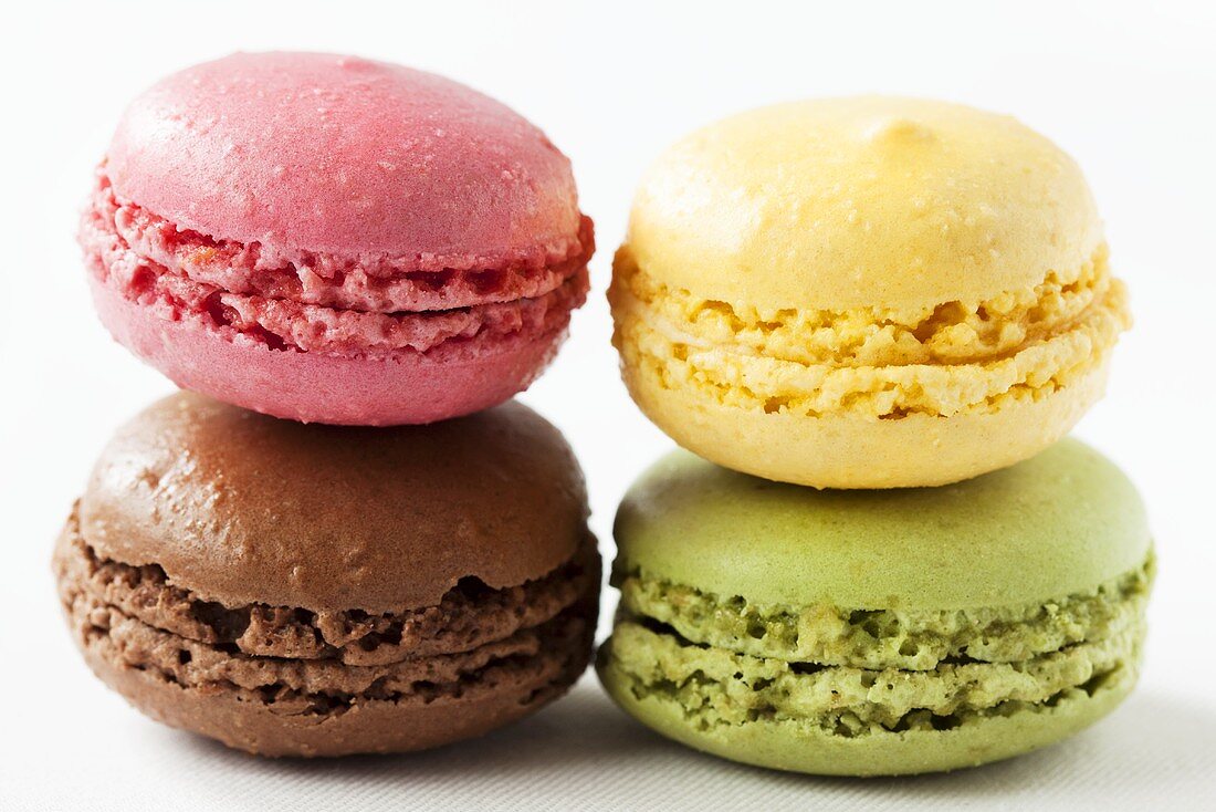 Four different coloured macarons