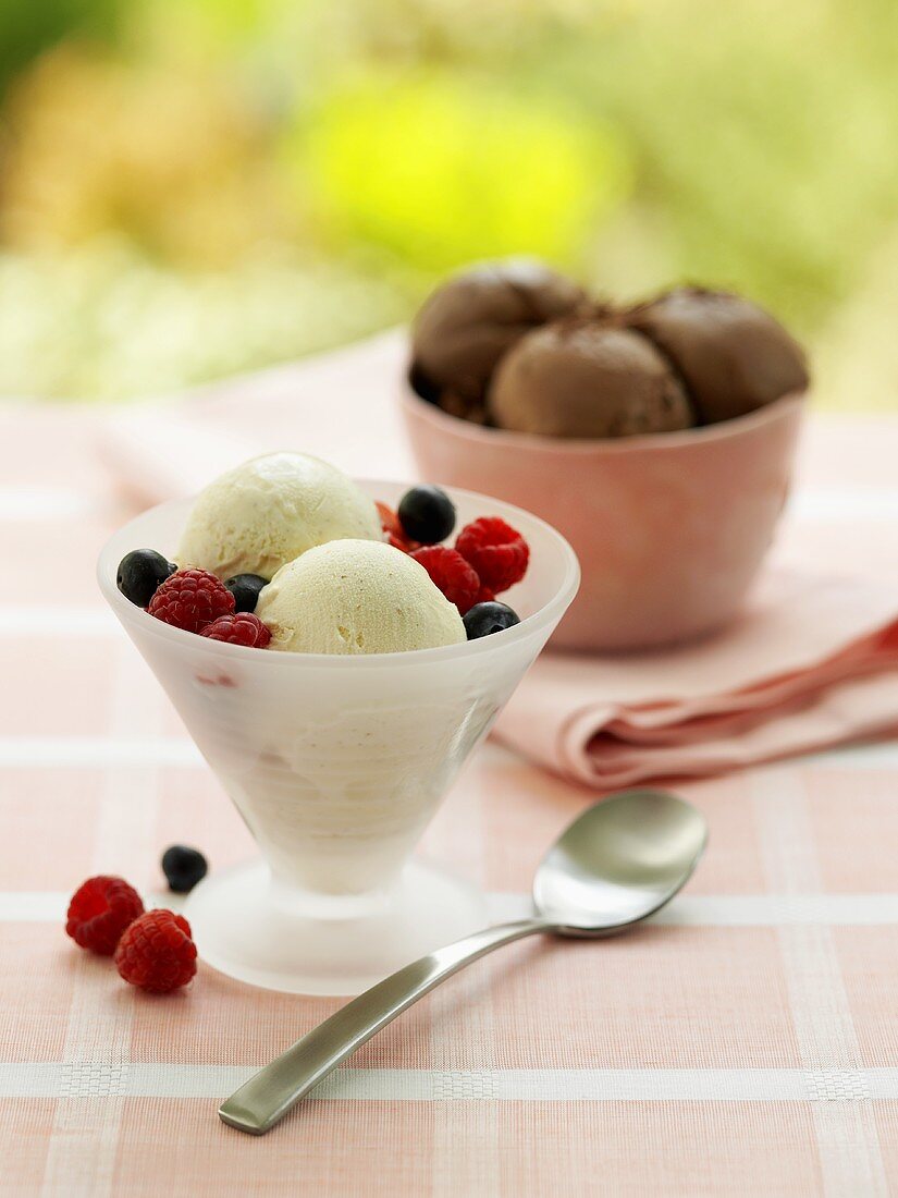 Ice cream with fresh berries in a sundae glass