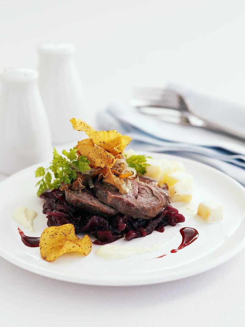 Beef on red wine onions with corn chips
