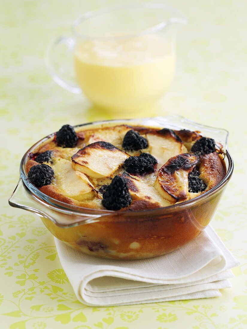 Blackberry and apple pudding with custard