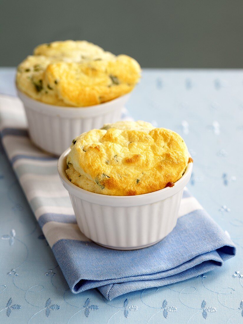 Two cheese and spinach soufflés