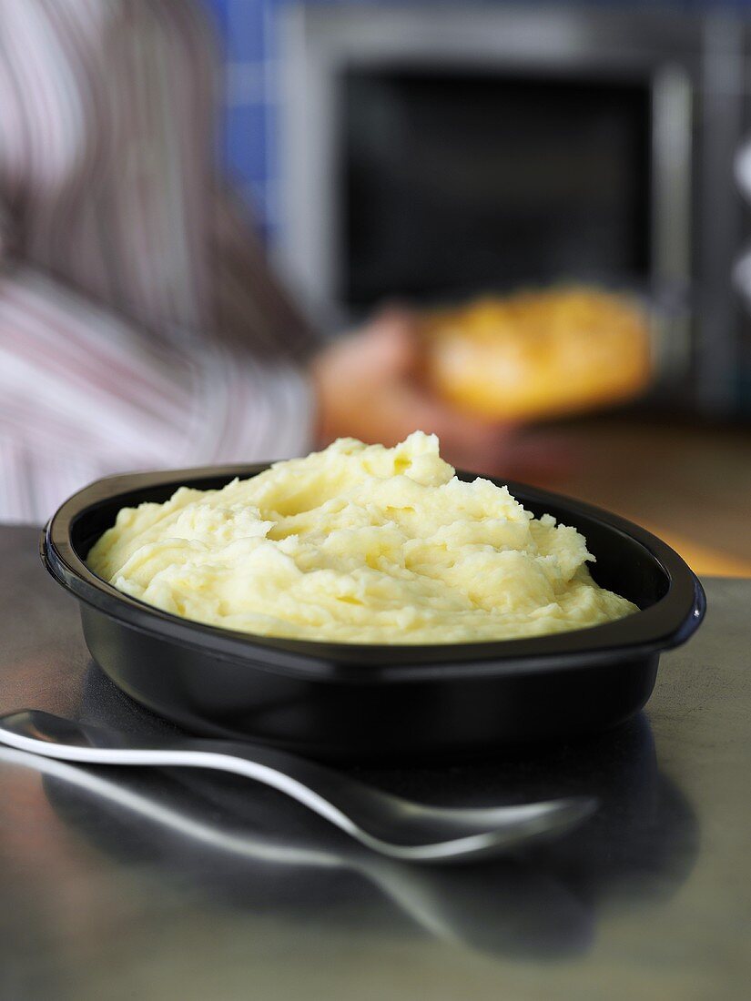 Take-away mashed potato in plastic dish