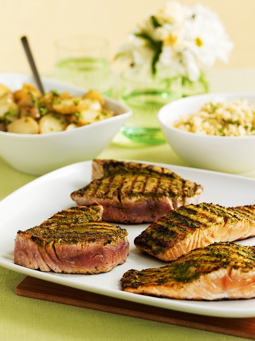 Barbequed salmon and tuna steaks
