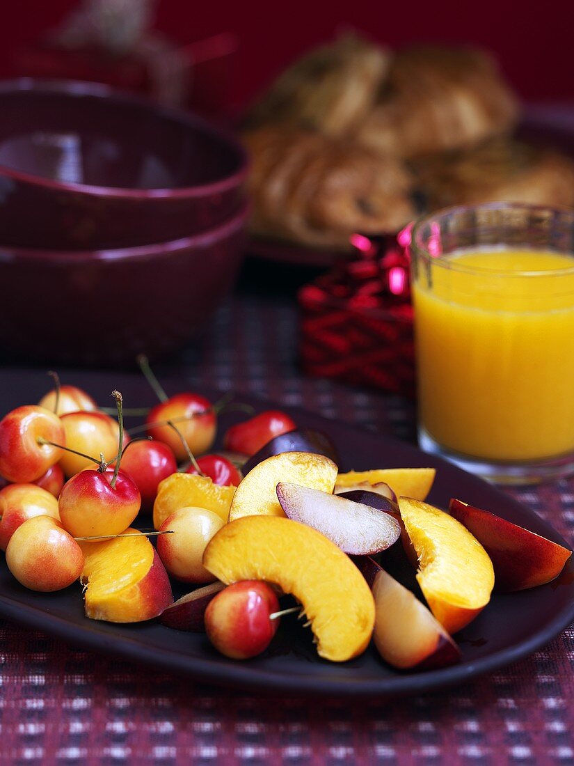 Christmas breakfast with fruit salad and orange juice
