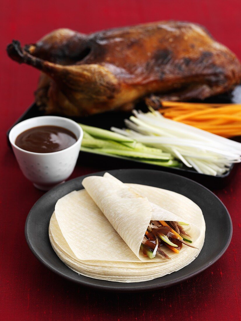 Roast goose with vegetable wraps and dip
