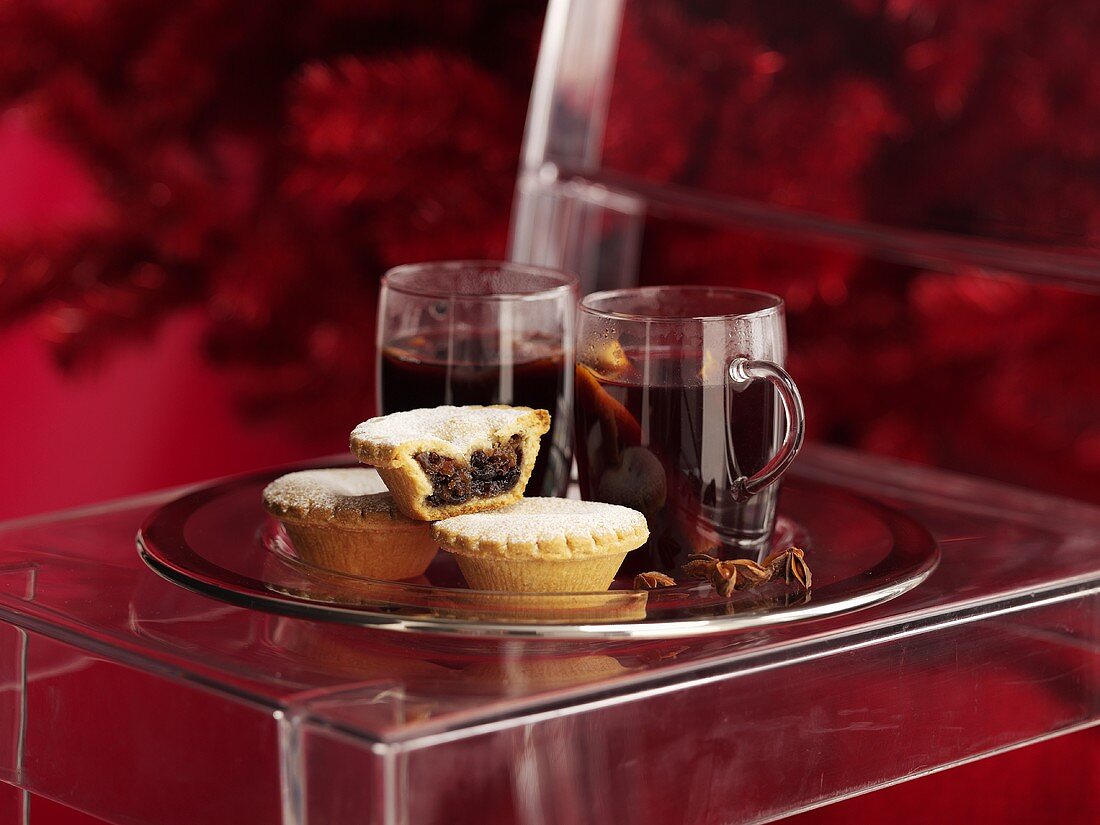 Mulled wine and mince pies on a silver plate