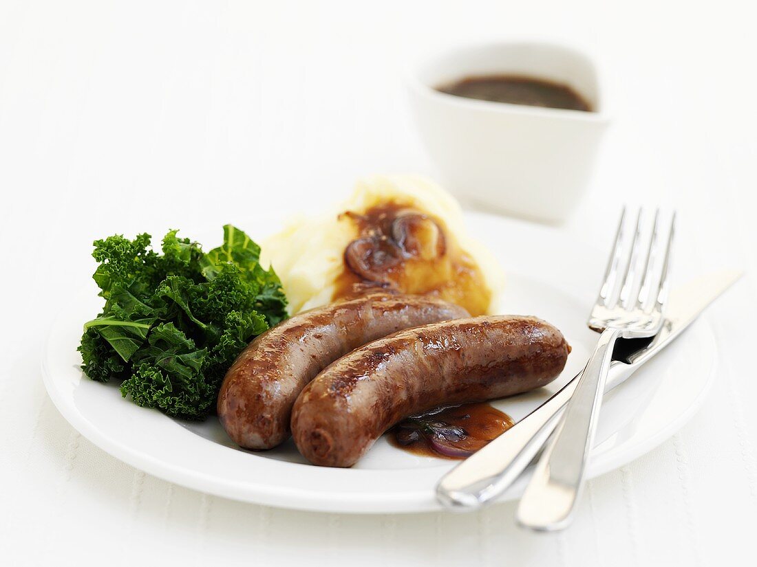 Beef sausages with broccoli and mashed potato
