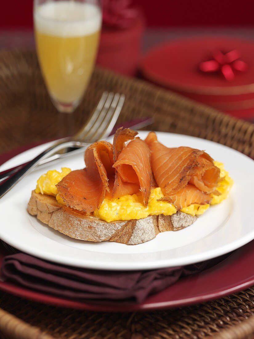 Champagne breakfast with scrambled egg and salmon toast