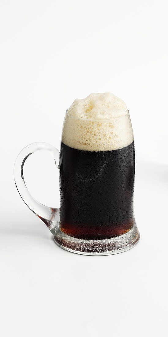 Dark beer in a glass tankard