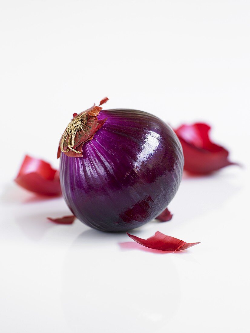 A peeled, red onion
