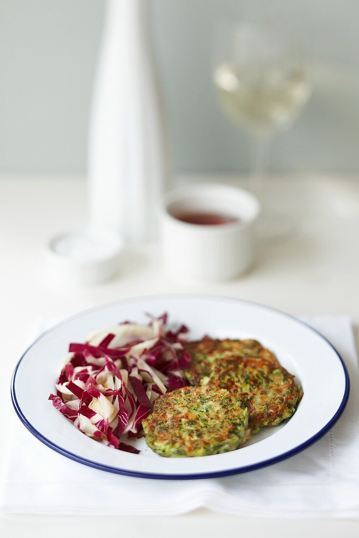 Courgette cakes with radicchio