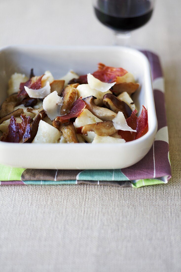 Gnocchi with fried ceps and ham