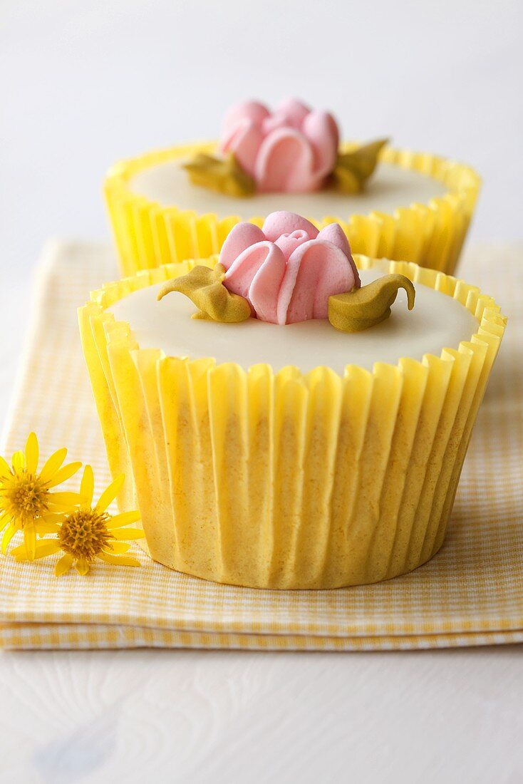 Lemon cupcakes with sugar flowers