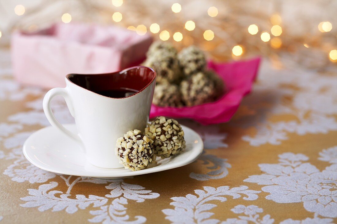 Chocolate truffles with chopped nuts