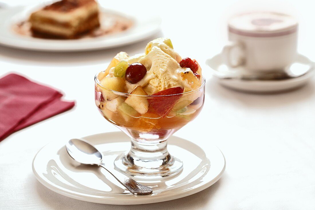 Fruit salad with vanilla ice cream