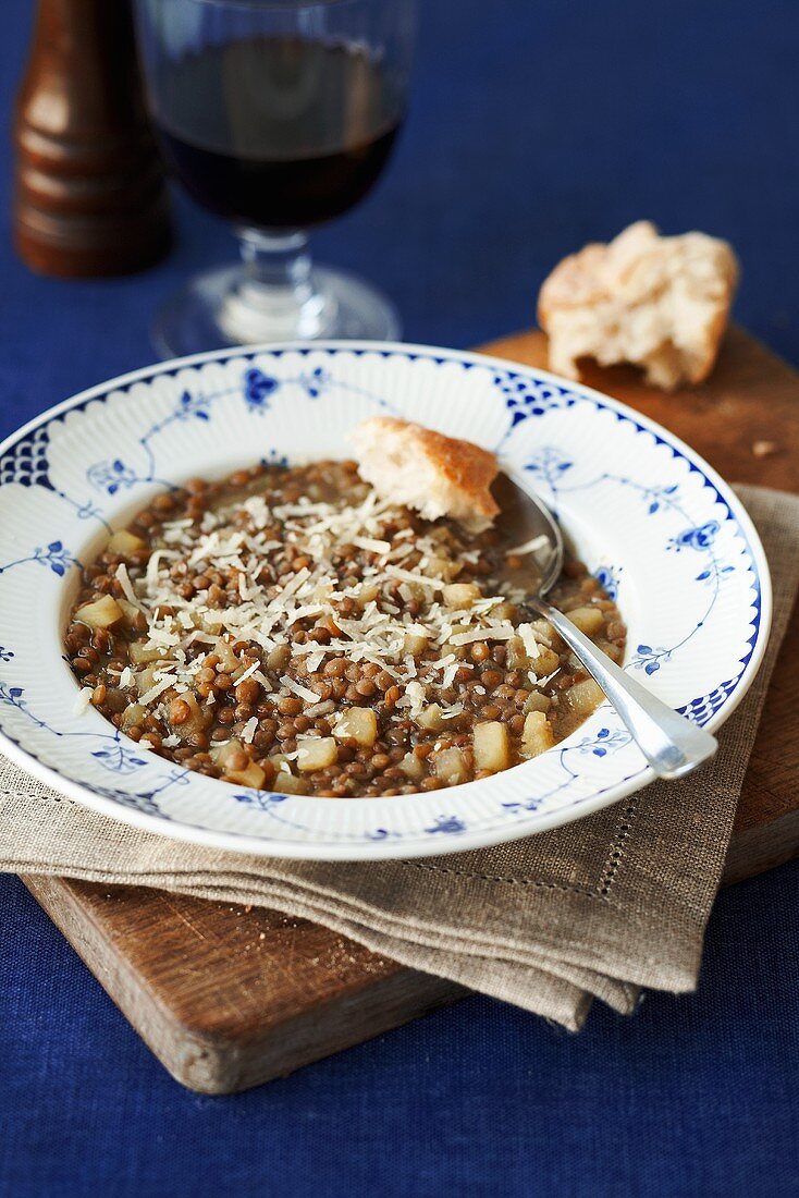 Lentil and apple soup with grated cheese