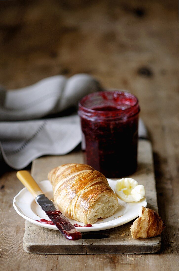 Croissant with raspberry jam