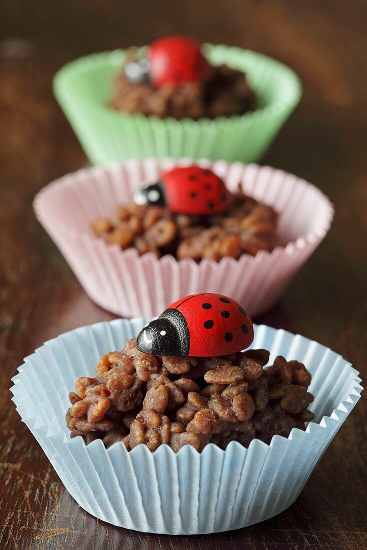 Chocolate crispies in paper cases with ladybirds