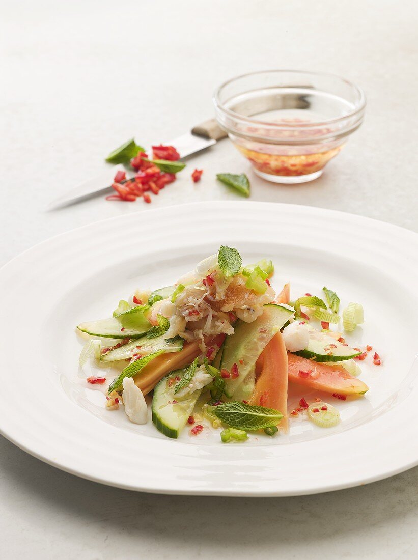 Papaya and cucumber salad with crabmeat and chilli dressing
