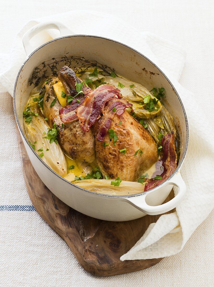 Guinea fowl with chicory and bacon