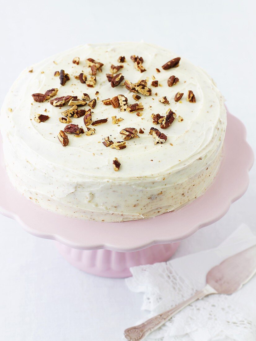 Iced carrot cake with pecans