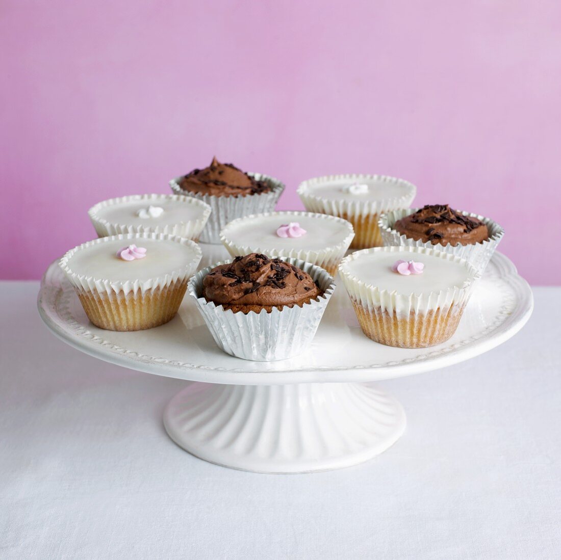 Assorted cupcakes on cake stand