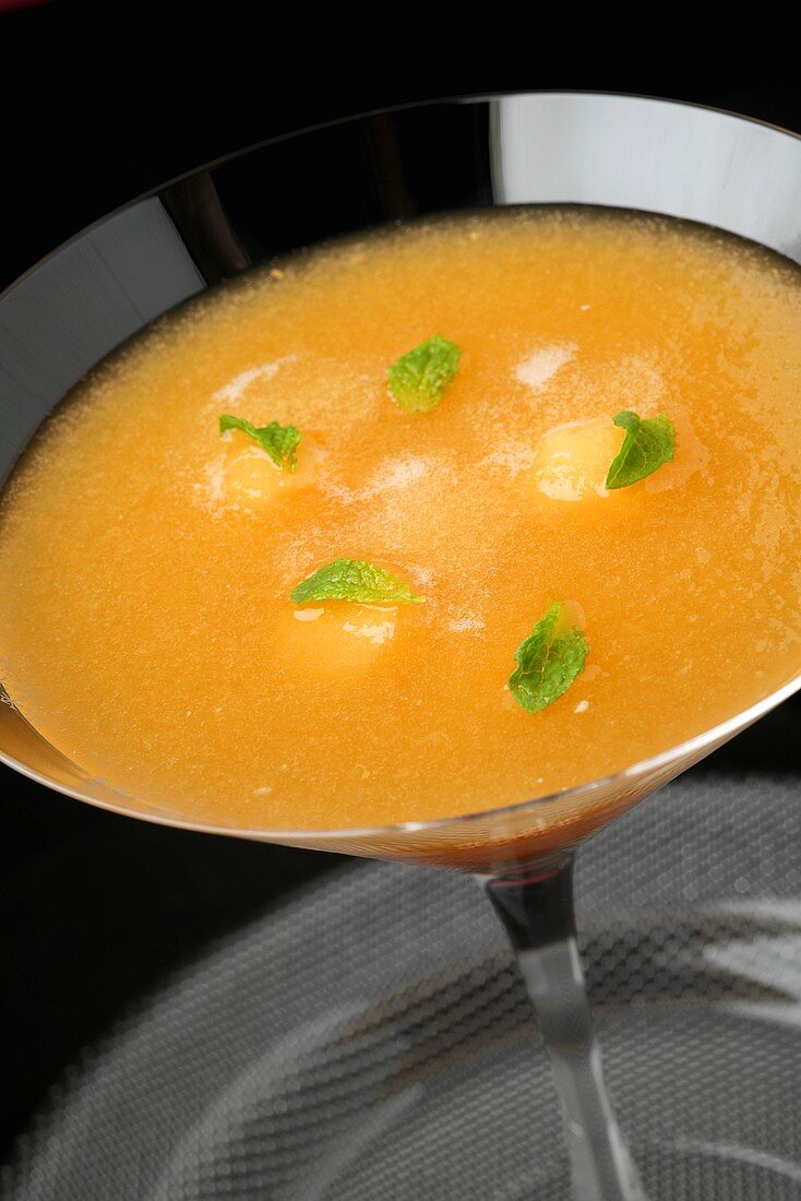 Cold melon and champagne soup with mint