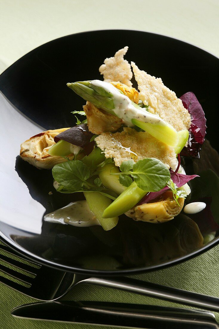 Artichoke and asparagus salad with cheese crisp