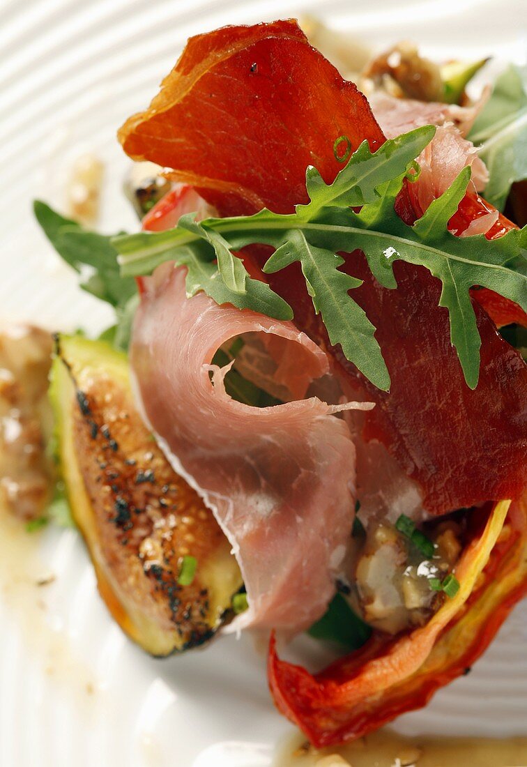 Salad of Parma ham, rocket and grilled figs