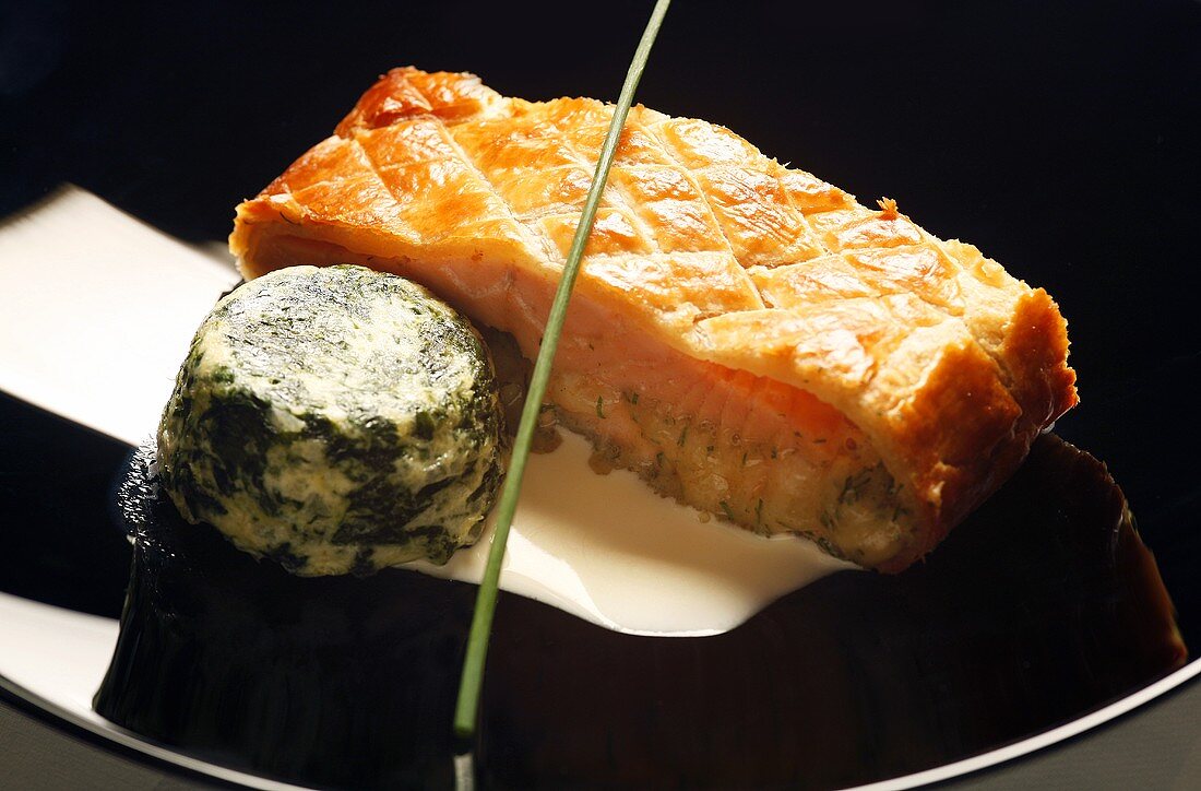 Gravlax in puff pastry with spinach timbale and sherry cream