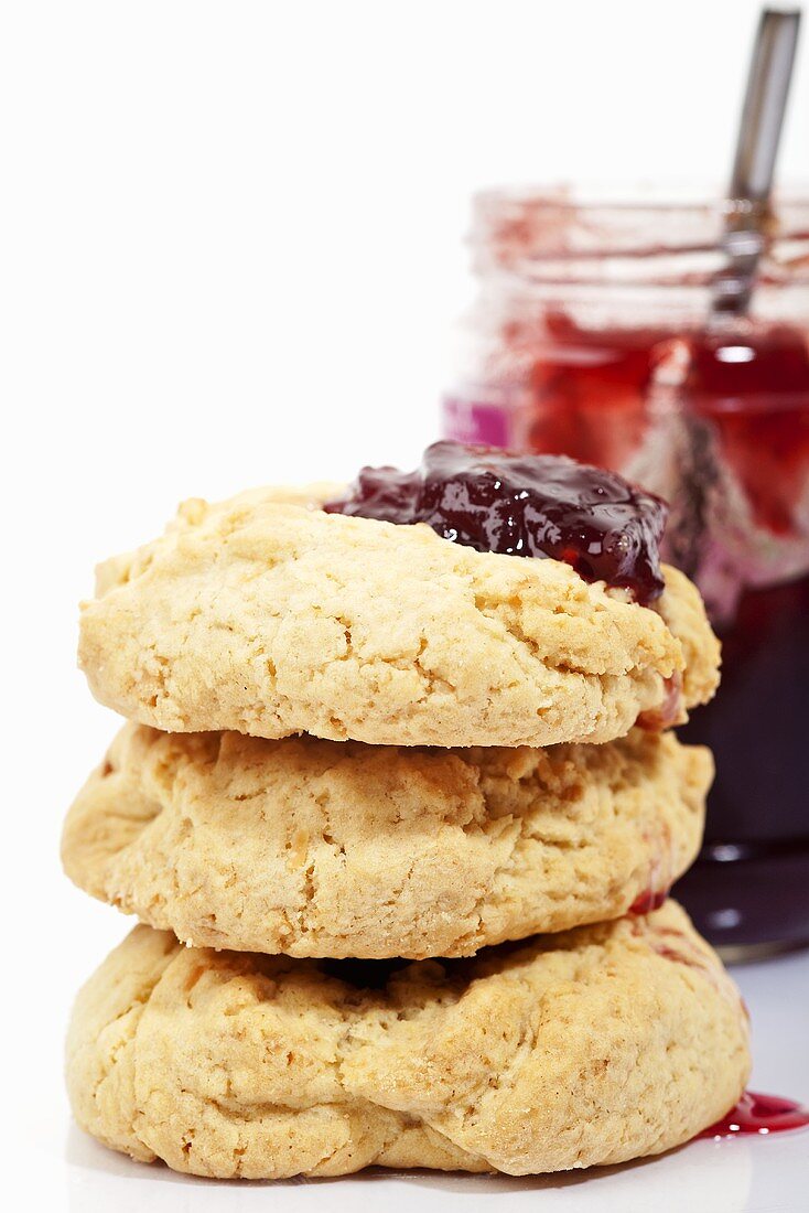 Three coconut biscuits with jam