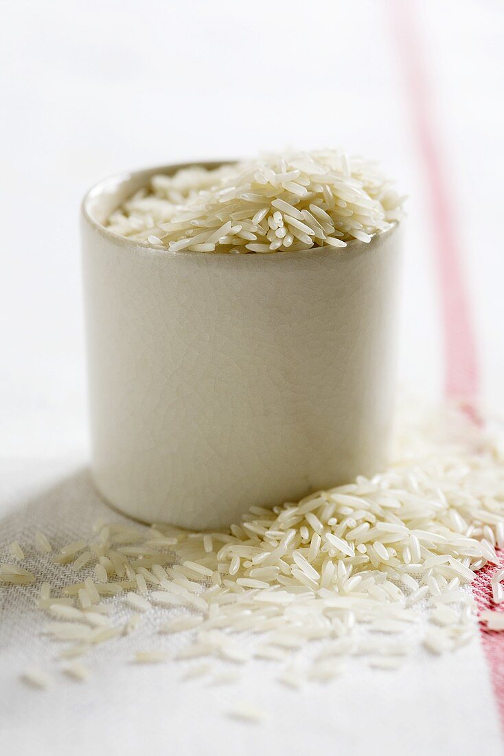Basmati rice in and beside small pot