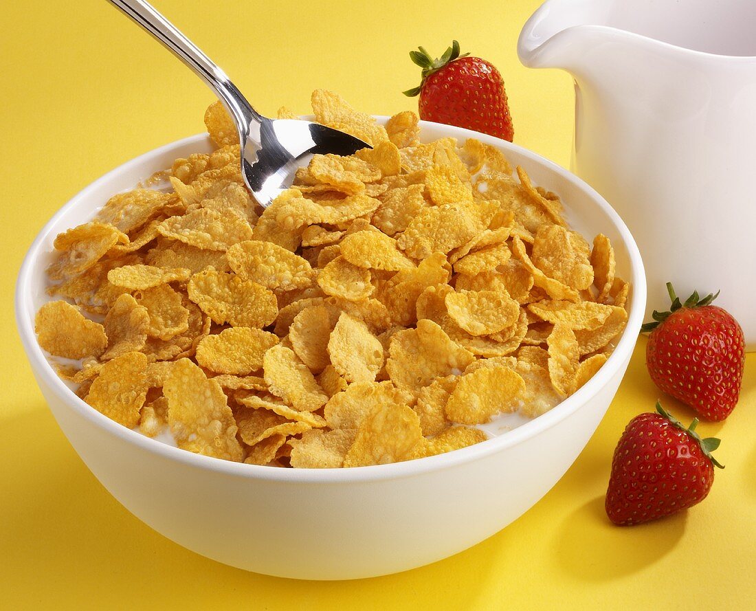 A bowl of cornflakes with milk