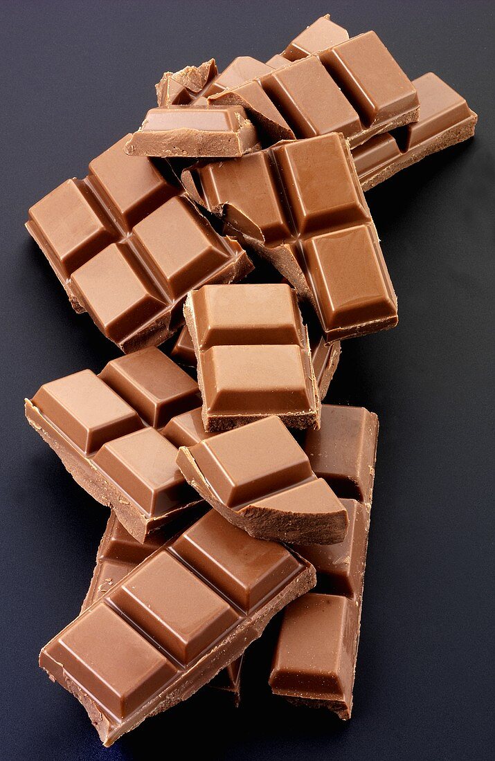 Pieces of chocolate on a black background
