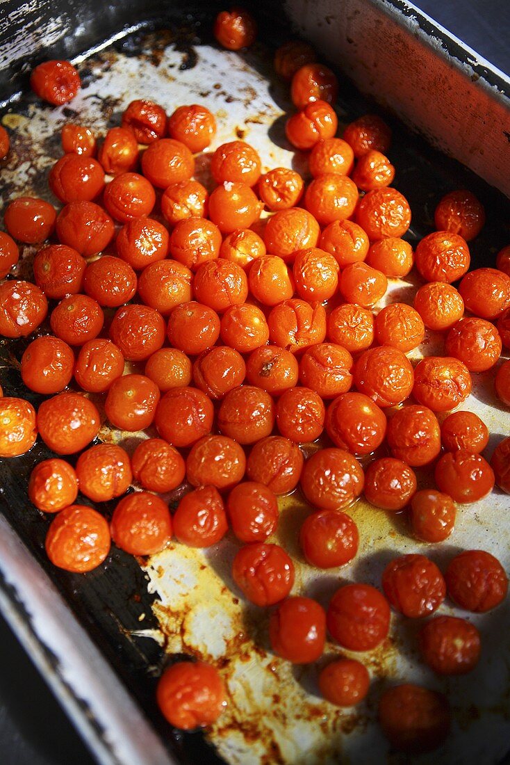 Roasted tomatoes on a baking tray