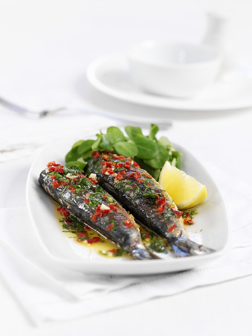 Fried sardines with herbs and lamb's lettuce