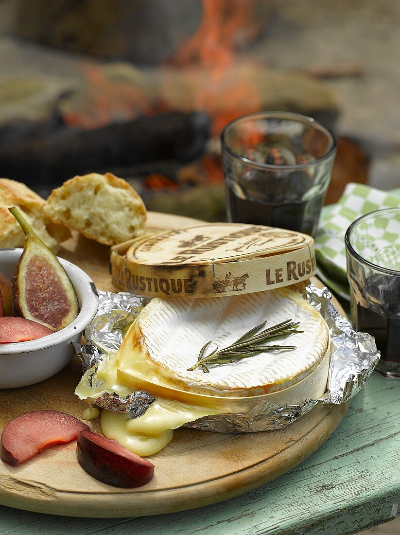 Baked Camembert, plums and figs