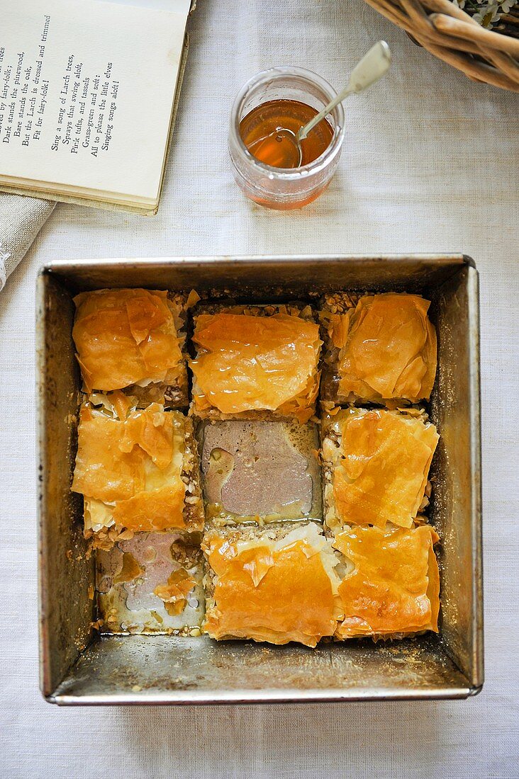 Puff pastry cake in a baking tin