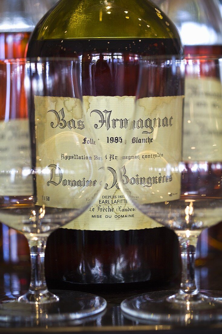 A bottle of Armagnac and glasses