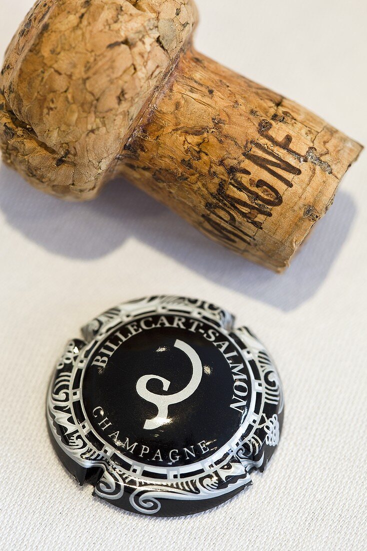 A champagne cork and cap