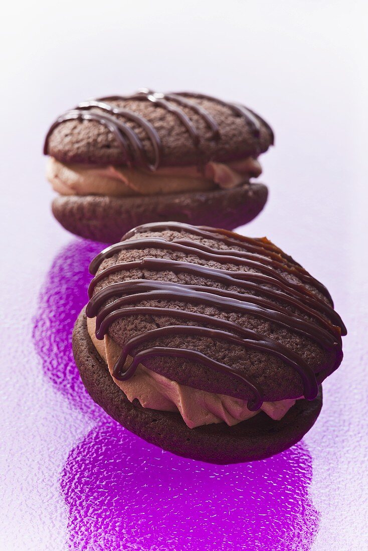Two chocolate whoopie pies