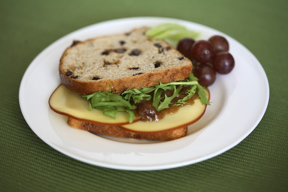 A cheese, chutney and rocket sandwich